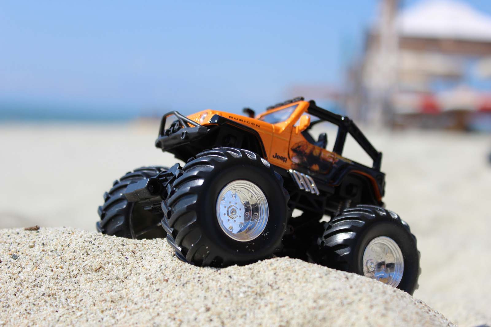 Jeep toy on sand